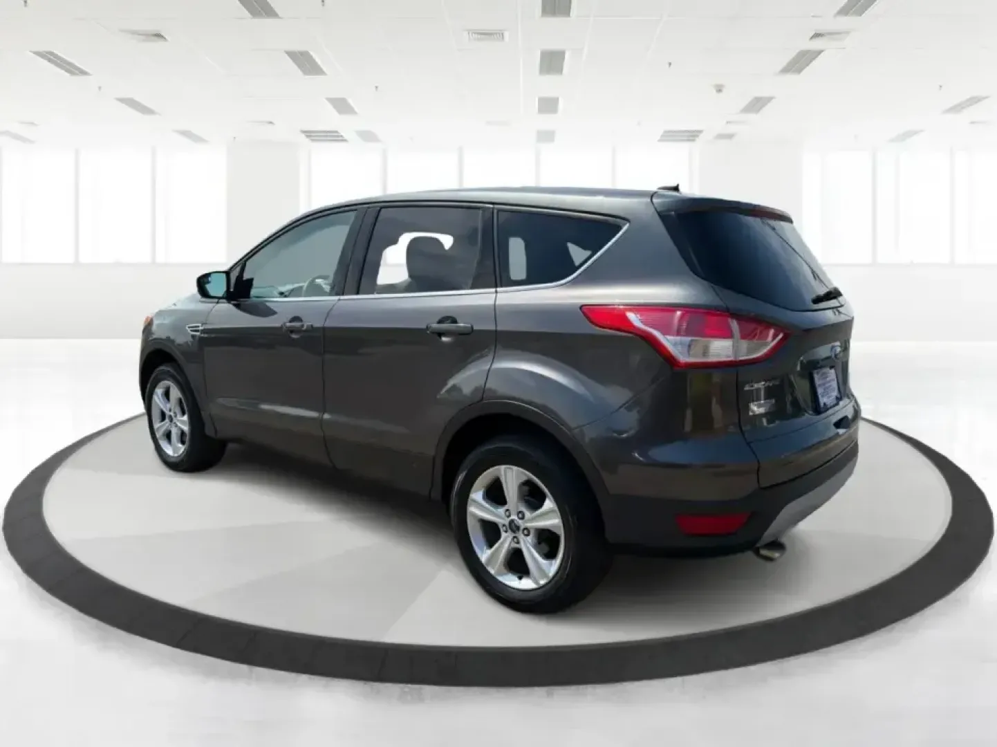 2016 Ford Escape SE (1FMCU0G77GU) with an 2.5L L4 DOHC 16V engine, 6-Speed Automatic transmission, located at 4508 South Dixie Dr, Moraine, OH, 45439, (937) 908-9800, 39.689976, -84.218452 - Whether you're commuting up and down South Dixie Drive, running errands between Moraine and Dayton, or packing up for a weekend getaway, this 2016 Ford Escape SE is the kind of practical SUV that fits real life. It's easy to park, comfortable for daily driving, and versatile enough for everything fr - Photo#4