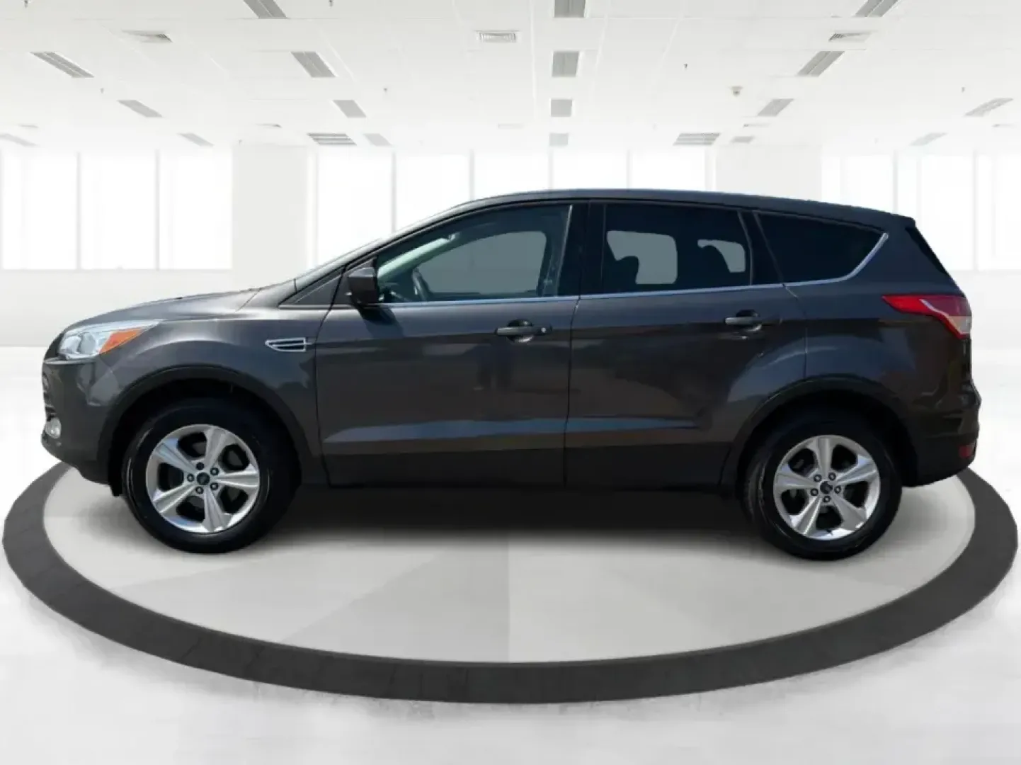 2016 Ford Escape SE (1FMCU0G77GU) with an 2.5L L4 DOHC 16V engine, 6-Speed Automatic transmission, located at 4508 South Dixie Dr, Moraine, OH, 45439, (937) 908-9800, 39.689976, -84.218452 - Whether you're commuting up and down South Dixie Drive, running errands between Moraine and Dayton, or packing up for a weekend getaway, this 2016 Ford Escape SE is the kind of practical SUV that fits real life. It's easy to park, comfortable for daily driving, and versatile enough for everything fr - Photo#5