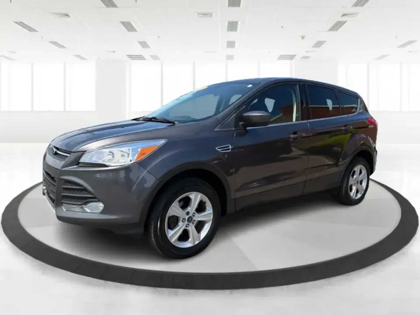 2016 Ford Escape SE (1FMCU0G77GU) with an 2.5L L4 DOHC 16V engine, 6-Speed Automatic transmission, located at 4508 South Dixie Dr, Moraine, OH, 45439, (937) 908-9800, 39.689976, -84.218452 - Whether you're commuting up and down South Dixie Drive, running errands between Moraine and Dayton, or packing up for a weekend getaway, this 2016 Ford Escape SE is the kind of practical SUV that fits real life. It's easy to park, comfortable for daily driving, and versatile enough for everything fr - Photo#8