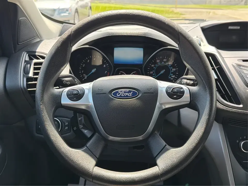 2016 Ford Escape SE (1FMCU0G77GU) with an 2.5L L4 DOHC 16V engine, 6-Speed Automatic transmission, located at 4508 South Dixie Dr, Moraine, OH, 45439, (937) 908-9800, 39.689976, -84.218452 - Whether you're commuting up and down South Dixie Drive, running errands between Moraine and Dayton, or packing up for a weekend getaway, this 2016 Ford Escape SE is the kind of practical SUV that fits real life. It's easy to park, comfortable for daily driving, and versatile enough for everything fr - Photo#16