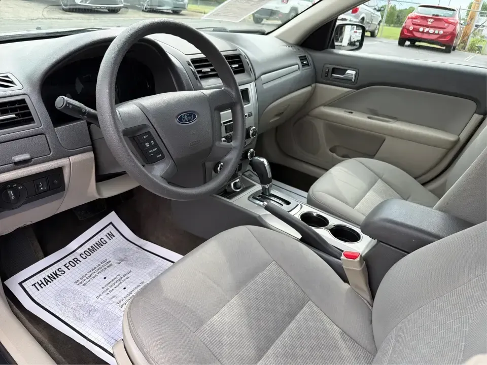 2012 Ford Fusion S (3FAHP0GA3CR) with an 2.5L L4 DOHC 16V engine, located at 1099 N County Rd 25A, Troy, OH, 45373, (937) 908-9800, 40.057079, -84.212883 - Need a dependable commuter that still feels comfortable for weekend plans and family errands around Miami County? This 2012 Ford Fusion S sedan is a smart fit for life in Troy, Ohio-easy to park downtown, smooth on longer drives up I75, and practical for everything from school drop-offs to shopping - Photo#9