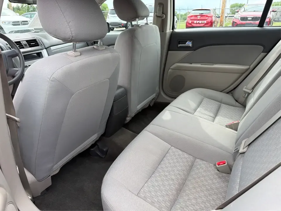 2012 Ford Fusion S (3FAHP0GA3CR) with an 2.5L L4 DOHC 16V engine, located at 1099 N County Rd 25A, Troy, OH, 45373, (937) 908-9800, 40.057079, -84.212883 - Need a dependable commuter that still feels comfortable for weekend plans and family errands around Miami County? This 2012 Ford Fusion S sedan is a smart fit for life in Troy, Ohio-easy to park downtown, smooth on longer drives up I75, and practical for everything from school drop-offs to shopping - Photo#10