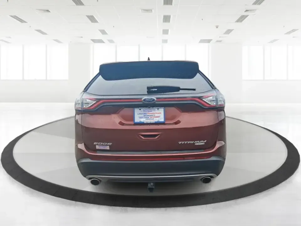 2016 Ford Edge Titanium (2FMPK3K91GB) with an 2.0L L4 DOHC 16V engine, 6A transmission, located at 4508 South Dixie Dr, Moraine, OH, 45439, (937) 908-9800, 39.689976, -84.218452 - Picture your next Ohio weekend: loading up groceries for the week in Moraine, grabbing coffee off South Dixie Drive, then cruising I-75 toward Dayton's Riverscape MetroPark or a quick family road trip to Carillon Historical Park-without feeling cramped, stressed, or under-equipped. This **2016 Ford - Photo#3