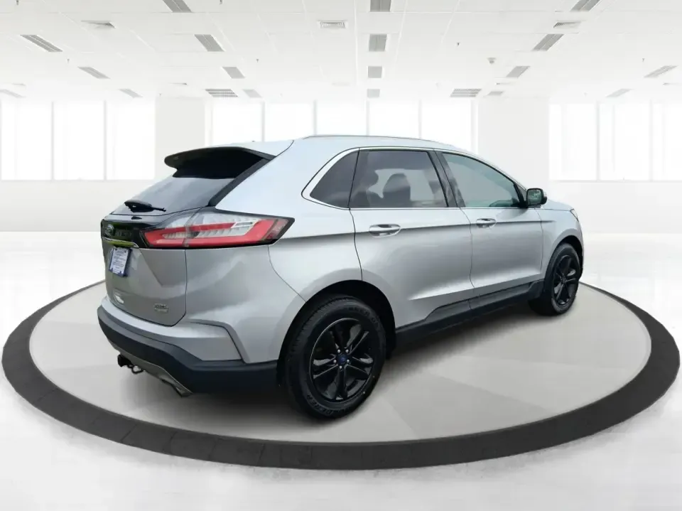 2019 Ford Edge SEL (2FMPK4J98KB) with an EcoBoost 2L I-4 gasoline direct injection engine, 6A transmission, located at 8750 N County Rd 25A, Piqua, OH, 45356, (937) 908-9800, 40.164391, -84.232513 - Picture your next road trip up I75, a week of school drop-offs, or a snowy Ohio commute that still feels calm and comfortable-this 2019 Ford Edge SEL AWD is built for real life. With confident all-wheel drive and a practical SUV layout, it's a smart fit for growing families, busy professionals, and - Photo#2