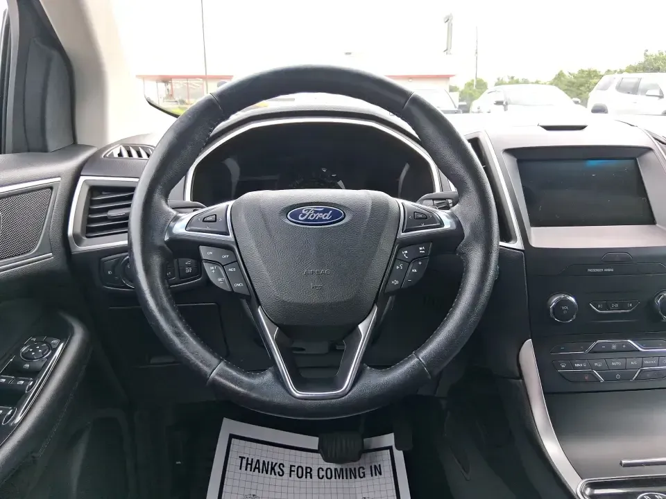2019 Ford Edge SEL (2FMPK4J98KB) with an EcoBoost 2L I-4 gasoline direct injection engine, 6A transmission, located at 8750 N County Rd 25A, Piqua, OH, 45356, (937) 908-9800, 40.164391, -84.232513 - Picture your next road trip up I75, a week of school drop-offs, or a snowy Ohio commute that still feels calm and comfortable-this 2019 Ford Edge SEL AWD is built for real life. With confident all-wheel drive and a practical SUV layout, it's a smart fit for growing families, busy professionals, and - Photo#16