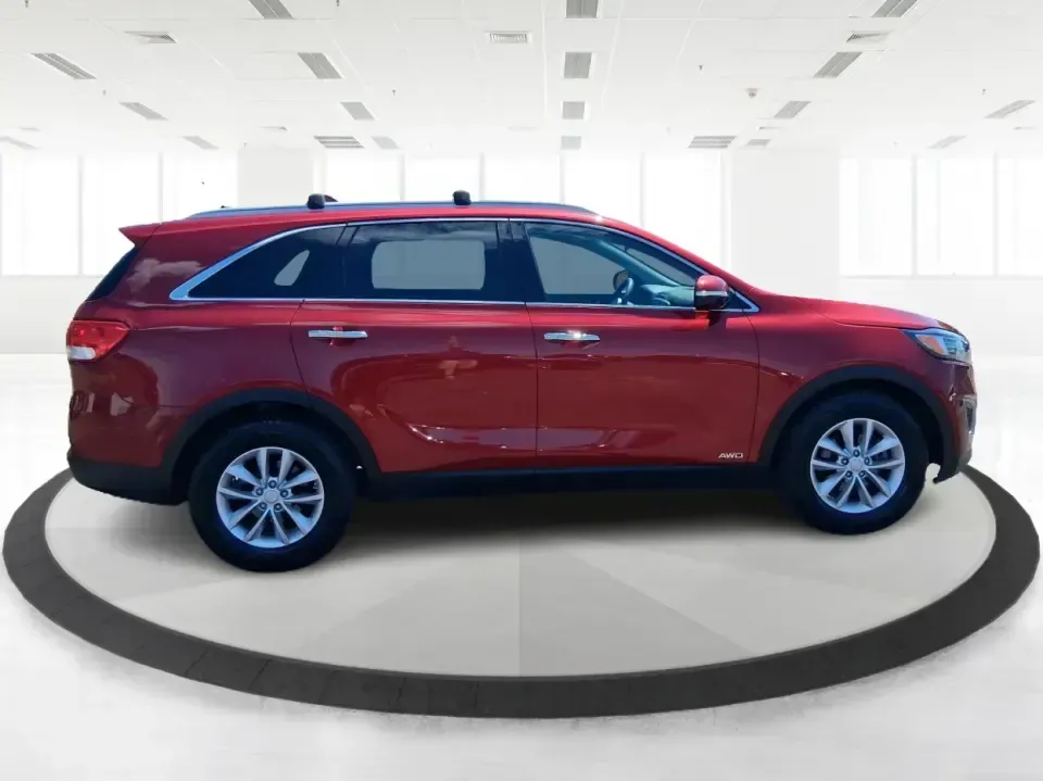 2017 Kia Sorento 2.4L LX (5XYPGDA37HG) with an 2.4L I-4 gasoline direct injection engine, 6A transmission, located at 8750 N County Rd 25A, Piqua, OH, 45356, (937) 908-9800, 40.164391, -84.232513 - Picture your next road trip out of Vandalia with room for the whole crew, the gear, and the groceries-without giving up everyday comfort. This **2017 Kia Sorento LX (2.4L)** in eye-catching **Remington Red** is the kind of SUV that fits real life: school drop-offs, long commutes to Dayton, weekend r - Photo#1
