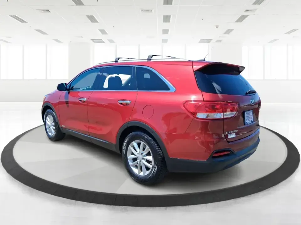 2017 Kia Sorento 2.4L LX (5XYPGDA37HG) with an 2.4L I-4 gasoline direct injection engine, 6A transmission, located at 8750 N County Rd 25A, Piqua, OH, 45356, (937) 908-9800, 40.164391, -84.232513 - Picture your next road trip out of Vandalia with room for the whole crew, the gear, and the groceries-without giving up everyday comfort. This **2017 Kia Sorento LX (2.4L)** in eye-catching **Remington Red** is the kind of SUV that fits real life: school drop-offs, long commutes to Dayton, weekend r - Photo#4