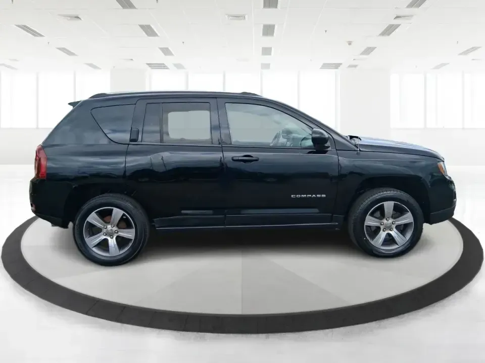 2017 Jeep Compass High Altitude FWD (1C4NJCEBXHD) with an 2.4L L4 DOHC 16V engine, CVT transmission, located at 1951 S Dayton Lakeview Rd., New Carlisle, OH, 45344, (937) 908-9800, 39.890999, -84.050255 - Picture your next week looking simpler: a comfortable SUV for the daily commute down I70, school drop-offs, and spontaneous Saturday drives to Buck Creek State Park-without feeling like you have to put your life on hold while you shop for financing. This 2017 Jeep Compass High Altitude FWD in Black - Photo#1