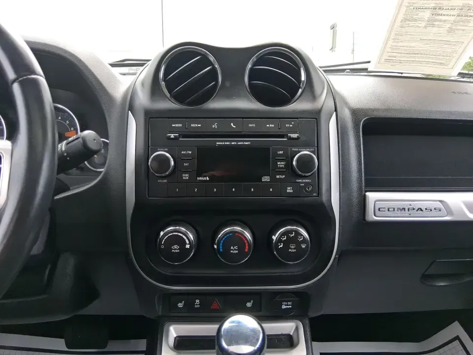 2017 Jeep Compass High Altitude FWD (1C4NJCEBXHD) with an 2.4L L4 DOHC 16V engine, CVT transmission, located at 1951 S Dayton Lakeview Rd., New Carlisle, OH, 45344, (937) 908-9800, 39.890999, -84.050255 - Picture your next week looking simpler: a comfortable SUV for the daily commute down I70, school drop-offs, and spontaneous Saturday drives to Buck Creek State Park-without feeling like you have to put your life on hold while you shop for financing. This 2017 Jeep Compass High Altitude FWD in Black - Photo#13