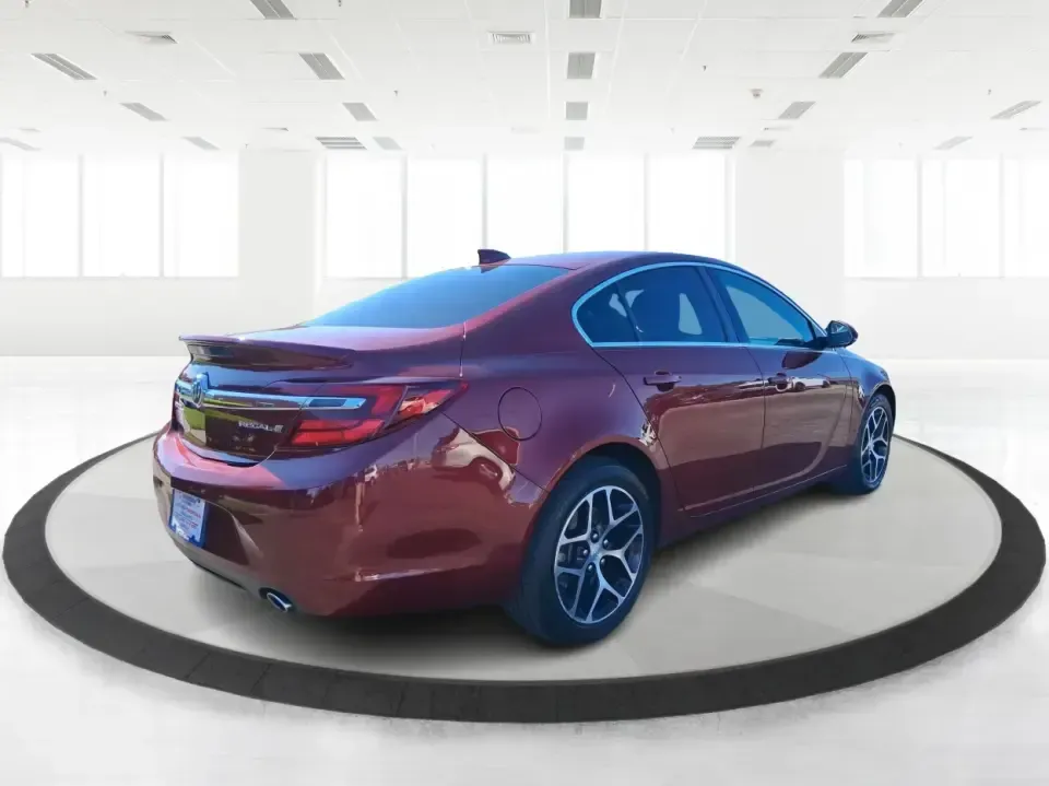 2017 Buick Regal Turbo Sport Touring (2G4GL5EX9H9) with an 2L I-4 gasoline direct injection engine, 6A transmission, located at 8750 N County Rd 25A, Piqua, OH, 45356, (937) 908-9800, 40.164391, -84.232513 - Need a sporty, comfortable commuter that still feels special on date night, errands around town, or a weekend run up I75? This 2017 Buick Regal Turbo Sport Touring in Crimson Red Tintcoat fits the lifestyle of drivers who want a refined sedan with confident power for daily miles, plus the kind of fe - Photo#2