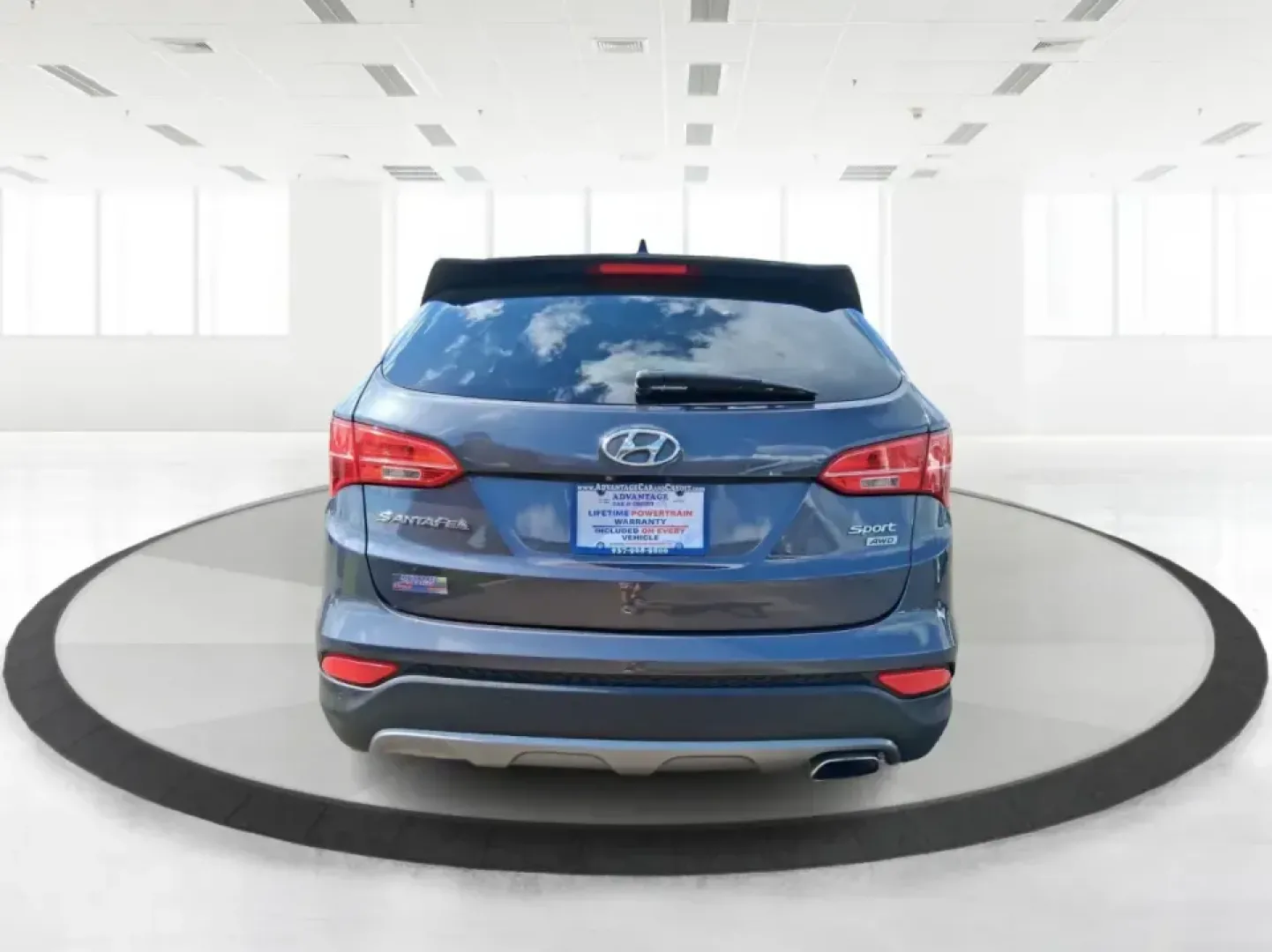 2015 Hyundai Santa Fe 2.4L (5XYZUDLB3FG) with an Theta II 2.4L I-4 gasoline direct injection engine, 6-Speed Automatic transmission, located at 1230 East Main St, Xenia, OH, 45385, (937) 908-9800, 39.688026, -83.910172 - Pack up the kids, load the cooler, and point your weekend plans toward the open road-this 2015 Hyundai Santa Fe 2.4L in Platinum Graphite is the kind of SUV that fits real life in Riverside. Whether you're commuting down I-75, running errands along Woodman Dr, or heading out for a day at Eastwood Me - Photo#3
