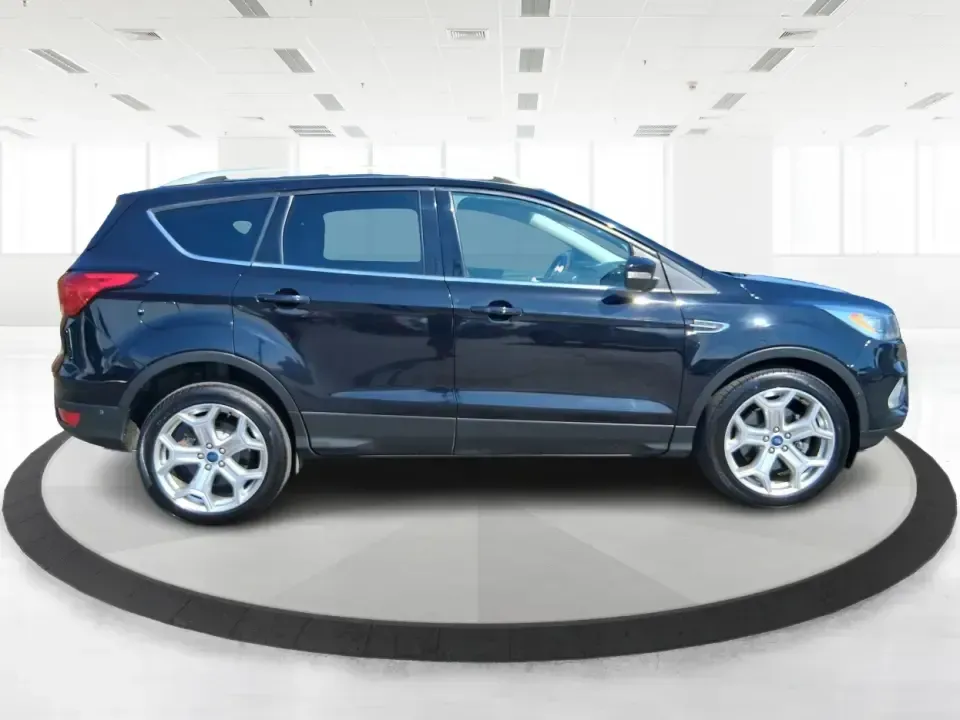 2019 Ford Escape Titanium (1FMCU9J9XKU) with an EcoBoost 2L I-4 gasoline direct injection engine, 6A transmission, located at 8750 N County Rd 25A, Piqua, OH, 45356, (937) 908-9800, 40.164391, -84.232513 - Pack up the kids, load the groceries, or point the hood toward a weekend getaway-this 2019 Ford Escape Titanium 4WD is built for real life in West Central Ohio, where commutes, school drop-offs, and quick trips up I75 all happen in the same week. With an upscale Titanium cabin and confident all-weat - Photo#1