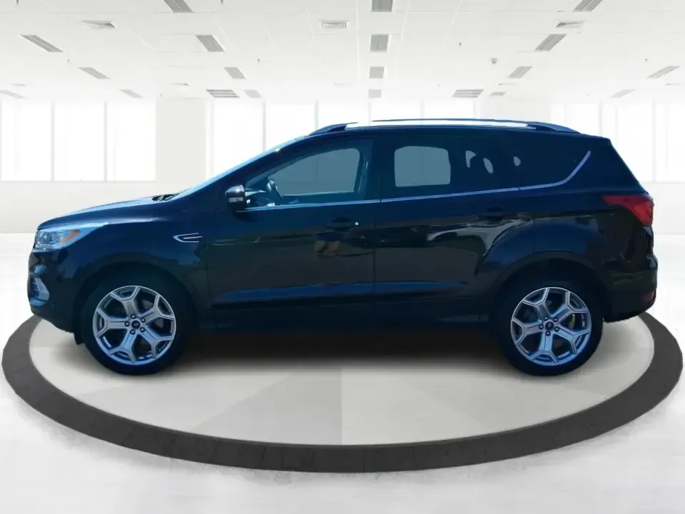 2019 Ford Escape Titanium (1FMCU9J9XKU) with an EcoBoost 2L I-4 gasoline direct injection engine, 6A transmission, located at 8750 N County Rd 25A, Piqua, OH, 45356, (937) 908-9800, 40.164391, -84.232513 - Pack up the kids, load the groceries, or point the hood toward a weekend getaway-this 2019 Ford Escape Titanium 4WD is built for real life in West Central Ohio, where commutes, school drop-offs, and quick trips up I75 all happen in the same week. With an upscale Titanium cabin and confident all-weat - Photo#5