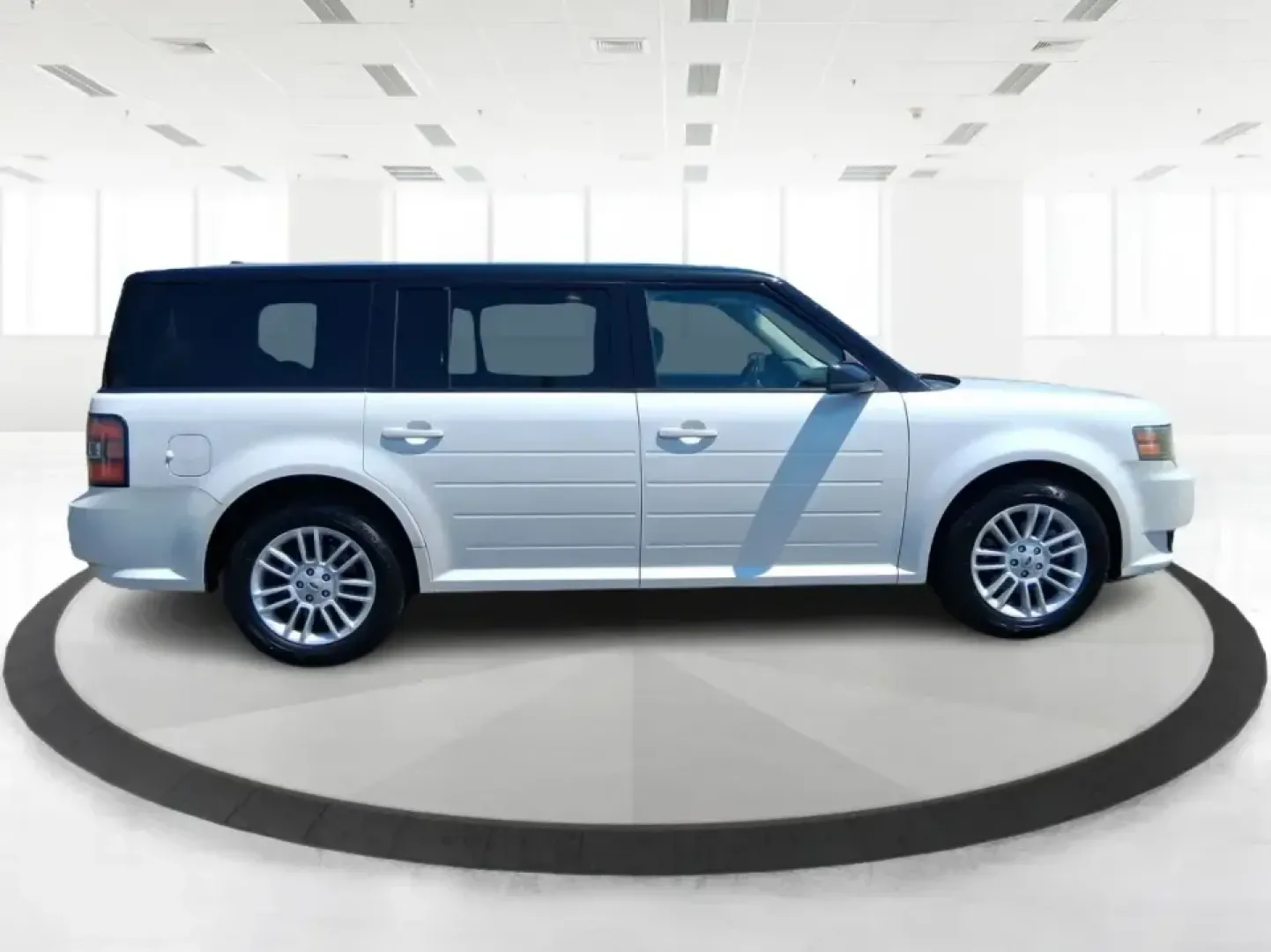 2011 Ford Flex Titanium (2FMGK5DC2BB) with an Duratec 3.5L V-6 DOHC engine, 6-Speed Automatic Overdrive transmission, located at 1951 S Dayton Lakeview Rd., New Carlisle, OH, 45344, (937) 908-9800, 39.890999, -84.050255 - Road-trip ready and family-friendly without feeling like a bus, this 2011 Ford Flex Limited | Titanium is the kind of crossover that fits real life-school drop-offs, long commutes, weekend tournaments, and those last-minute runs for groceries when the cargo space actually matters. Finished in White - Photo#1