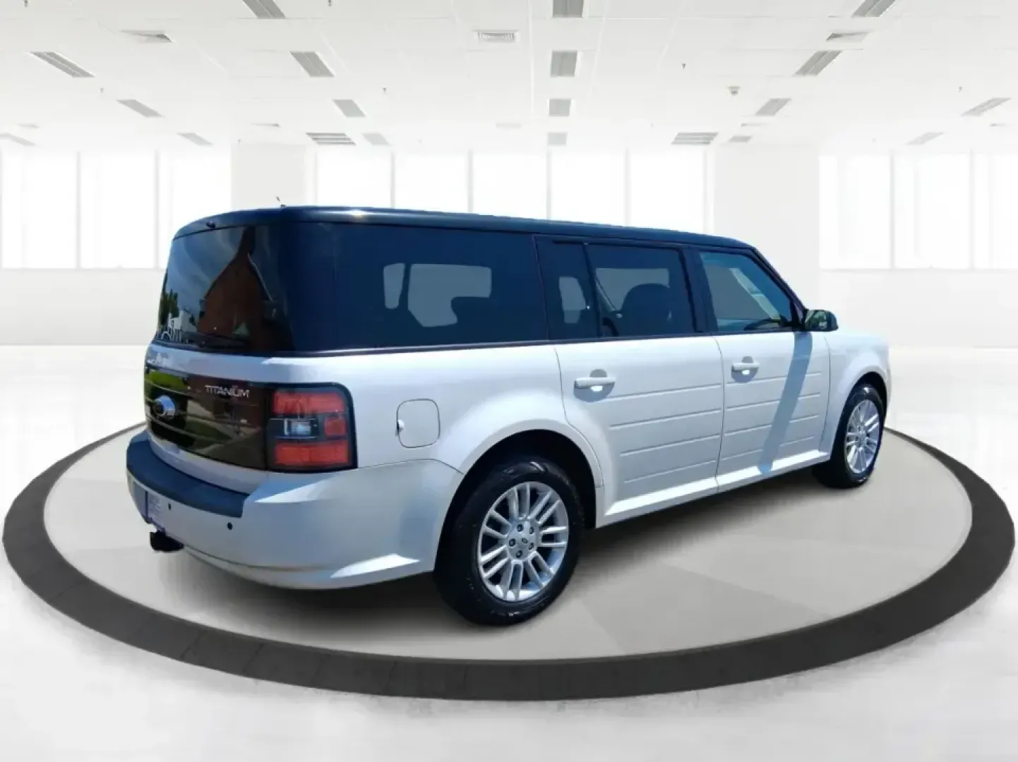 2011 Ford Flex Titanium (2FMGK5DC2BB) with an Duratec 3.5L V-6 DOHC engine, 6-Speed Automatic Overdrive transmission, located at 1951 S Dayton Lakeview Rd., New Carlisle, OH, 45344, (937) 908-9800, 39.890999, -84.050255 - Road-trip ready and family-friendly without feeling like a bus, this 2011 Ford Flex Limited | Titanium is the kind of crossover that fits real life-school drop-offs, long commutes, weekend tournaments, and those last-minute runs for groceries when the cargo space actually matters. Finished in White - Photo#2
