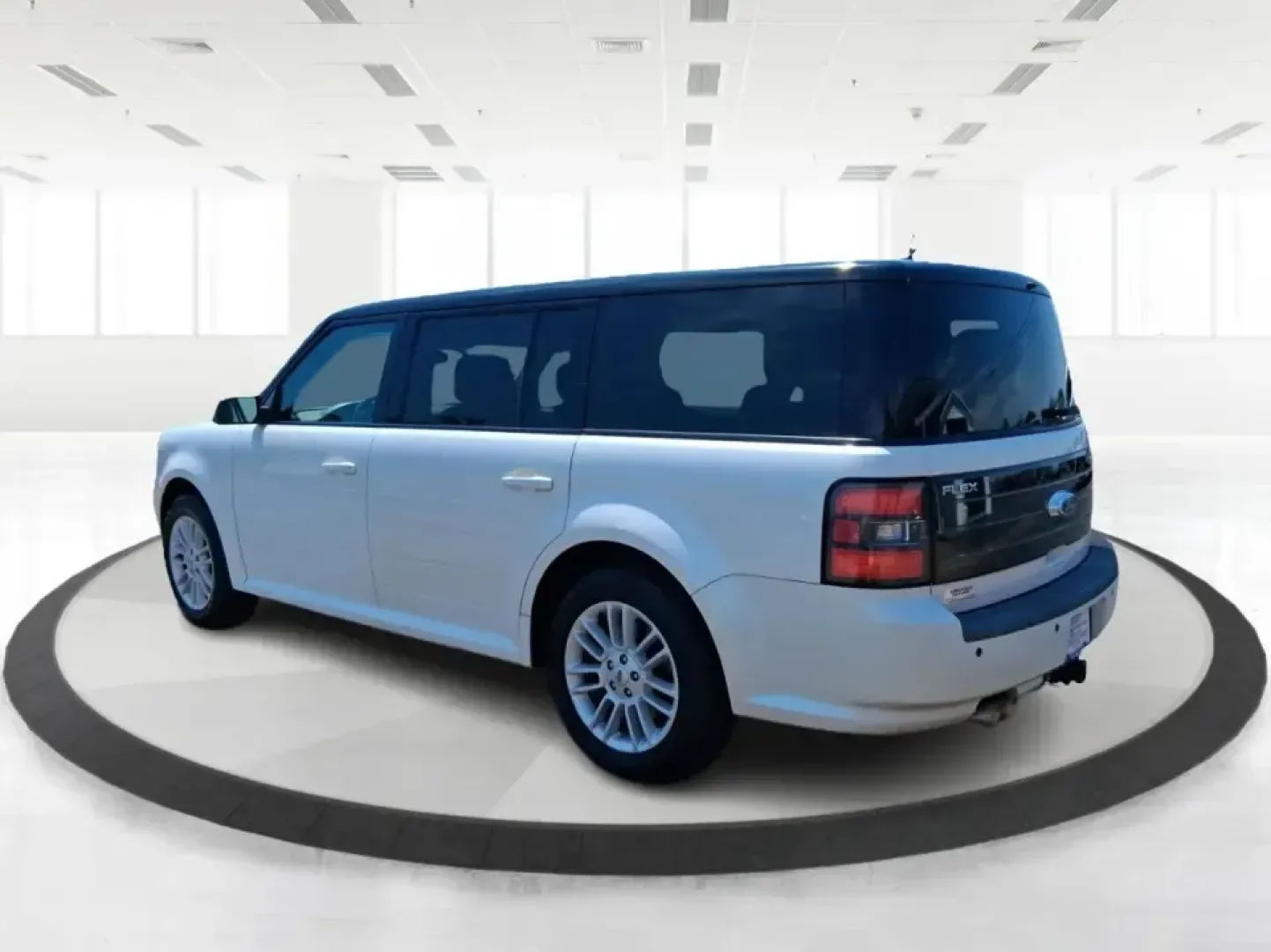 2011 Ford Flex Titanium (2FMGK5DC2BB) with an Duratec 3.5L V-6 DOHC engine, 6-Speed Automatic Overdrive transmission, located at 1951 S Dayton Lakeview Rd., New Carlisle, OH, 45344, (937) 908-9800, 39.890999, -84.050255 - Road-trip ready and family-friendly without feeling like a bus, this 2011 Ford Flex Limited | Titanium is the kind of crossover that fits real life-school drop-offs, long commutes, weekend tournaments, and those last-minute runs for groceries when the cargo space actually matters. Finished in White - Photo#4