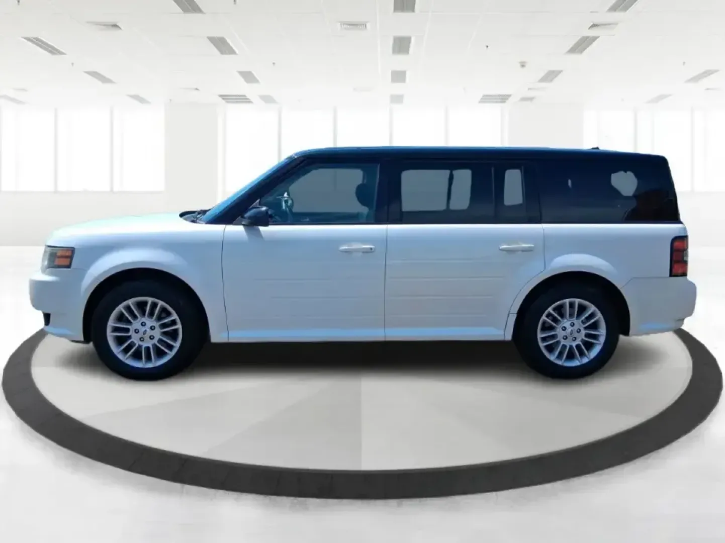 2011 Ford Flex Titanium (2FMGK5DC2BB) with an Duratec 3.5L V-6 DOHC engine, 6-Speed Automatic Overdrive transmission, located at 1951 S Dayton Lakeview Rd., New Carlisle, OH, 45344, (937) 908-9800, 39.890999, -84.050255 - Road-trip ready and family-friendly without feeling like a bus, this 2011 Ford Flex Limited | Titanium is the kind of crossover that fits real life-school drop-offs, long commutes, weekend tournaments, and those last-minute runs for groceries when the cargo space actually matters. Finished in White - Photo#5