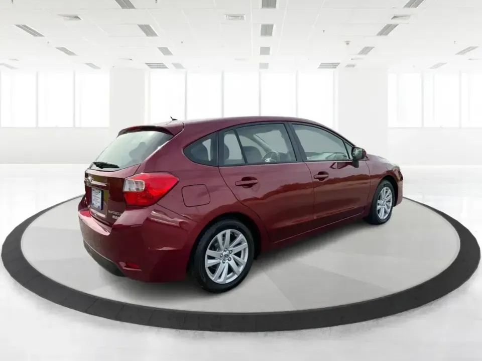 2016 Subaru Impreza 2.0i Premium (JF1GPAB6XG8) with an 2L H-4 DOHC engine, CVT transmission, located at 401 Woodman Dr, Riverside, OH, 45431, (937) 908-9800, 39.760899, -84.123421 - Need a practical daily driver that can handle Ohio weather, tight parking lots, and spontaneous weekend getaways? This **2016 Subaru Impreza 2.0i Premium Hatchback** is built for commuters, students, and small families who want confident traction, smart cargo space, and a comfortable cabin-whether y - Photo#2