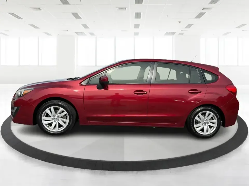 2016 Subaru Impreza 2.0i Premium (JF1GPAB6XG8) with an 2L H-4 DOHC engine, CVT transmission, located at 401 Woodman Dr, Riverside, OH, 45431, (937) 908-9800, 39.760899, -84.123421 - Need a practical daily driver that can handle Ohio weather, tight parking lots, and spontaneous weekend getaways? This **2016 Subaru Impreza 2.0i Premium Hatchback** is built for commuters, students, and small families who want confident traction, smart cargo space, and a comfortable cabin-whether y - Photo#5