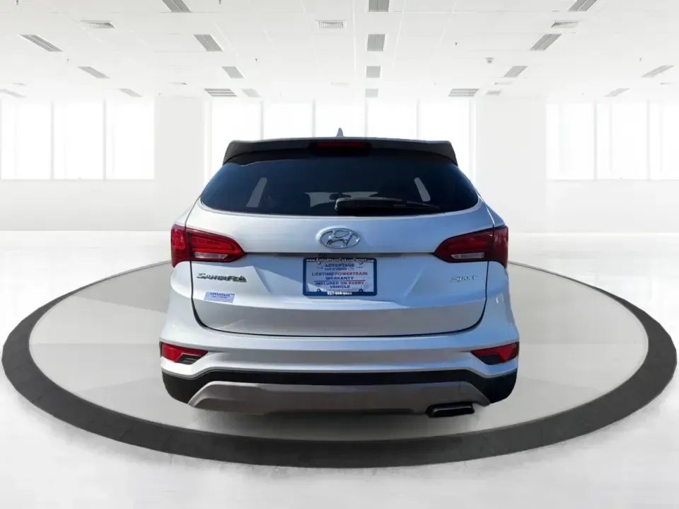 2017 Hyundai Santa Fe 2.4L (5XYZT3LB8HG) with an Theta II 2.4L I-4 gasoline direct injection engine, 6A transmission, located at 8750 N County Rd 25A, Piqua, OH, 45356, (937) 908-9800, 40.164391, -84.232513 - Load up the family, point the GPS toward a weekend getaway, and enjoy the confidence of an SUV that's built for everyday life in Ohio-this **2017 Hyundai Santa Fe 2.4L** is a smart pick for commuting, school runs, and road trips alike. Finished in **Sparkling Silver**, it brings the practical space - Photo#3