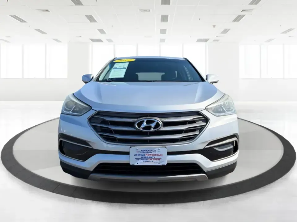 2017 Hyundai Santa Fe 2.4L (5XYZT3LB8HG) with an Theta II 2.4L I-4 gasoline direct injection engine, 6A transmission, located at 8750 N County Rd 25A, Piqua, OH, 45356, (937) 908-9800, 40.164391, -84.232513 - Load up the family, point the GPS toward a weekend getaway, and enjoy the confidence of an SUV that's built for everyday life in Ohio-this **2017 Hyundai Santa Fe 2.4L** is a smart pick for commuting, school runs, and road trips alike. Finished in **Sparkling Silver**, it brings the practical space - Photo#7