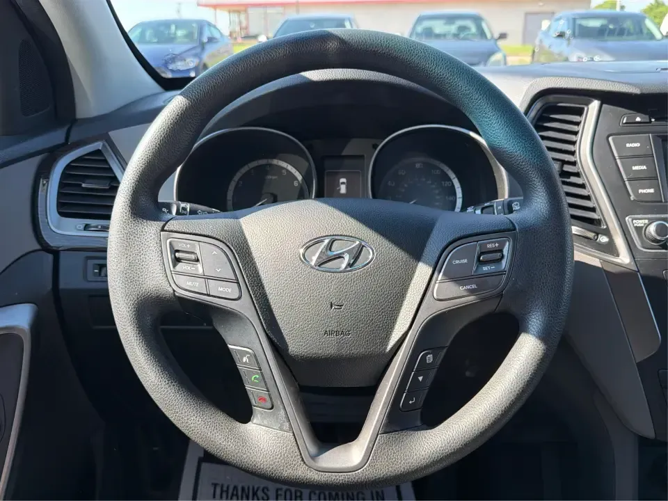 2017 Hyundai Santa Fe 2.4L (5XYZT3LB8HG) with an Theta II 2.4L I-4 gasoline direct injection engine, 6A transmission, located at 8750 N County Rd 25A, Piqua, OH, 45356, (937) 908-9800, 40.164391, -84.232513 - Load up the family, point the GPS toward a weekend getaway, and enjoy the confidence of an SUV that's built for everyday life in Ohio-this **2017 Hyundai Santa Fe 2.4L** is a smart pick for commuting, school runs, and road trips alike. Finished in **Sparkling Silver**, it brings the practical space - Photo#15