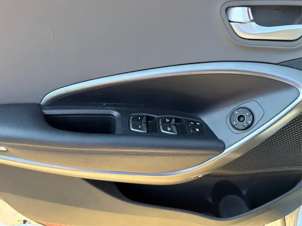 2017 Hyundai Santa Fe 2.4L (5XYZT3LB8HG) with an Theta II 2.4L I-4 gasoline direct injection engine, 6A transmission, located at 8750 N County Rd 25A, Piqua, OH, 45356, (937) 908-9800, 40.164391, -84.232513 - Load up the family, point the GPS toward a weekend getaway, and enjoy the confidence of an SUV that's built for everyday life in Ohio-this **2017 Hyundai Santa Fe 2.4L** is a smart pick for commuting, school runs, and road trips alike. Finished in **Sparkling Silver**, it brings the practical space - Photo#16