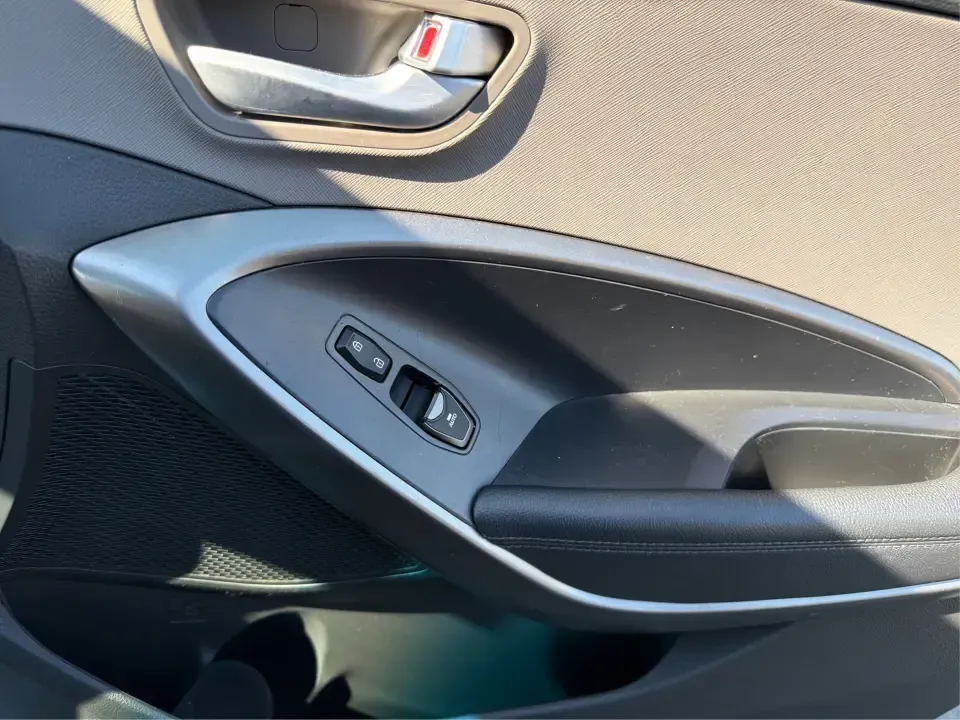 2017 Hyundai Santa Fe 2.4L (5XYZT3LB8HG) with an Theta II 2.4L I-4 gasoline direct injection engine, 6A transmission, located at 8750 N County Rd 25A, Piqua, OH, 45356, (937) 908-9800, 40.164391, -84.232513 - Load up the family, point the GPS toward a weekend getaway, and enjoy the confidence of an SUV that's built for everyday life in Ohio-this **2017 Hyundai Santa Fe 2.4L** is a smart pick for commuting, school runs, and road trips alike. Finished in **Sparkling Silver**, it brings the practical space - Photo#17
