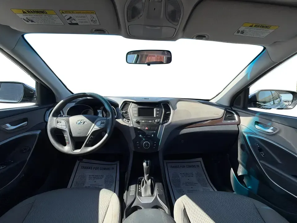 2017 Hyundai Santa Fe 2.4L (5XYZT3LB8HG) with an Theta II 2.4L I-4 gasoline direct injection engine, 6A transmission, located at 8750 N County Rd 25A, Piqua, OH, 45356, (937) 908-9800, 40.164391, -84.232513 - Load up the family, point the GPS toward a weekend getaway, and enjoy the confidence of an SUV that's built for everyday life in Ohio-this **2017 Hyundai Santa Fe 2.4L** is a smart pick for commuting, school runs, and road trips alike. Finished in **Sparkling Silver**, it brings the practical space - Photo#18