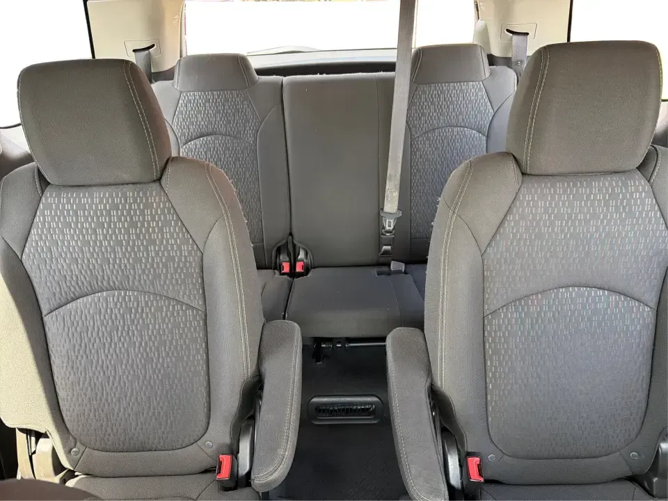 2016 GMC Acadia SLE-2 (1GKKVPKD1GJ) with an 3.6L V-6 gasoline direct injection engine, 6A transmission, located at 401 Woodman Dr, Riverside, OH, 45431, (937) 908-9800, 39.760899, -84.123421 - Need one SUV that can handle school drop-offs, long commutes, and weekend getaways to the MetroParks without feeling cramped? This 2016 GMC Acadia SLE-2 in Ebony Twilight Metallic is a smart fit for busy families and active drivers who want three-row flexibility, confident traction, and everyday com - Photo#13