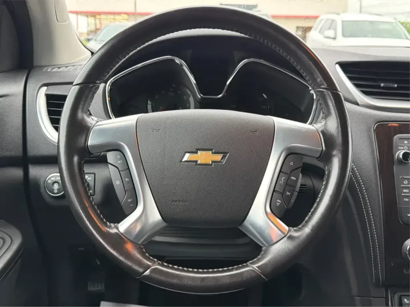 2016 Chevrolet Traverse 1LT (1GNKRGKD1GJ) with an 3.6L V-6 gasoline direct injection engine, 6A transmission, located at 8750 N County Rd 25A, Piqua, OH, 45356, (937) 908-9800, 40.164391, -84.232513 - Load up the kids, the cooler, and the weekend plans-this 2016 Chevrolet Traverse 1LT is the kind of family-ready SUV that makes school runs, long commutes, and Ohio road trips feel simpler. With three-row flexibility, a confident 3.6L V6, and everyday comfort features, it's a smart pick for growing- Photo#16