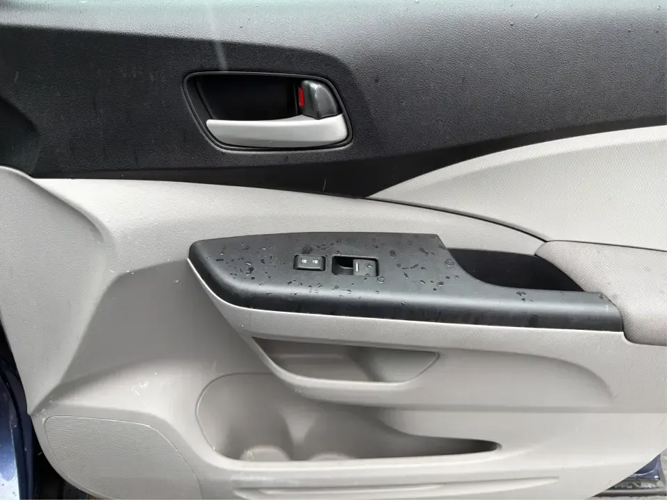 2014 Honda CR-V LX (2HKRM4H30EH) with an 2.4L I-4 DOHC engine, 5-Speed Automatic transmission, located at 401 Woodman Dr, Riverside, OH, 45431, (937) 908-9800, 39.760899, -84.123421 - Picture your next weekend: a quick run down Woodman Dr for errands, a family day at Riverscape MetroPark, or an easy I675 commute with room for groceries, strollers, and sports gear. This 2014 Honda CRV LX in Twilight Blue Metallic is the kind of practical SUV that fits real life in Riverside, Ohio- - Photo#17