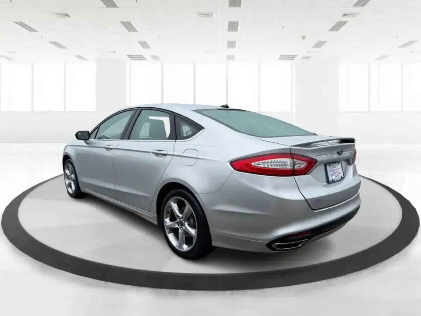 2014 Ford Fusion SE (3FA6P0H90ER) with an 2.0L L4 DOHC 16V engine, located at 1951 S Dayton Lakeview Rd., New Carlisle, OH, 45344, (937) 908-9800, 39.890999, -84.050255 - Picture your next week: smooth commutes down I70, quick errands to Kroger, and a comfortable weekend drive to Dayton or Springfield-without driving something that feels bare-bones. This 2014 Ford Fusion SE in Ingot Silver Metallic fits real life in New Carlisle, Ohio, with the kind of practical comf- Photo#4