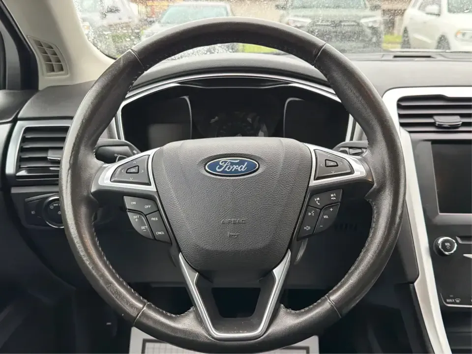 2014 Ford Fusion SE (3FA6P0H90ER) with an 2.0L L4 DOHC 16V engine, located at 1951 S Dayton Lakeview Rd., New Carlisle, OH, 45344, (937) 908-9800, 39.890999, -84.050255 - Need a smart, comfortable sedan for the daily drive from New Carlisle to Dayton, Wright-Patterson AFB, or Springfield-plus something that's still enjoyable for weekend trips to Buck Creek or an evening out near The Greene? This 2014 Ford Fusion SE blends commuter-friendly efficiency with upscale fea - Photo#16