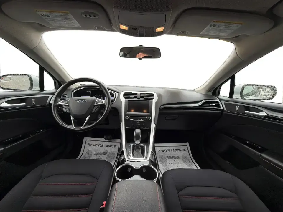 2014 Ford Fusion SE (3FA6P0H90ER) with an 2.0L L4 DOHC 16V engine, located at 1951 S Dayton Lakeview Rd., New Carlisle, OH, 45344, (937) 908-9800, 39.890999, -84.050255 - Need a smart, comfortable sedan for the daily drive from New Carlisle to Dayton, Wright-Patterson AFB, or Springfield-plus something that's still enjoyable for weekend trips to Buck Creek or an evening out near The Greene? This 2014 Ford Fusion SE blends commuter-friendly efficiency with upscale fea - Photo#21