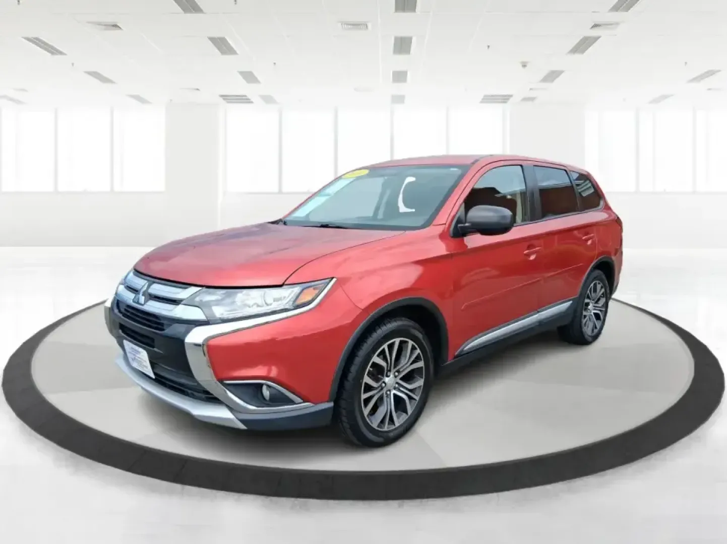 2016 Mitsubishi Outlander ES (JA4AZ3A34GZ) with an 2.4L I-4 variable valve control engine, CVT transmission, located at 401 Woodman Dr, Riverside, OH, 45431, (937) 908-9800, 39.760899, -84.123421 - Weekend getaways to Eastwood MetroPark, carpools across Riverside, and comfortable commutes down I675 feel a lot easier when you've got a versatile SUV that can flex with real life. This 2016 Mitsubishi Outlander ES in eye-catching Rally Red Metallic is built for the buyer who wants space, capabilit- Photo#8