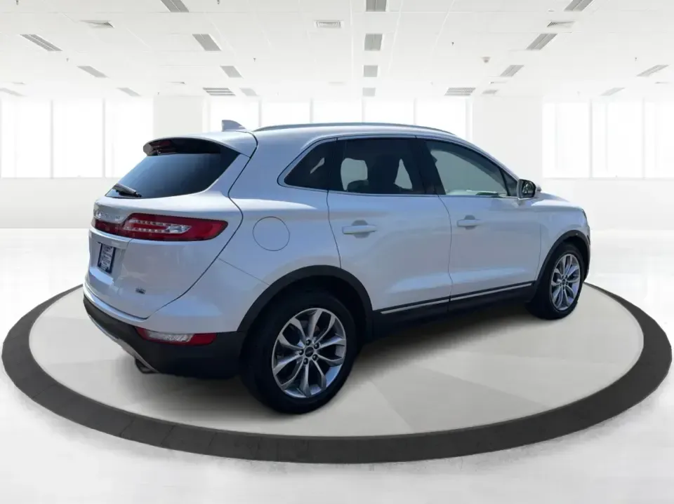 2015 Lincoln MKC Base (5LMTJ2AH4FU) with an 2.3L L4 DOHC 16V engine, 6-Speed Automatic transmission, located at 1230 East Main St, Xenia, OH, 45385, (937) 908-9800, 39.688026, -83.910172 - Upgrade your everyday drive with a compact luxury SUV that fits real life-comfortable for long commutes up and down US-35, confident for snowy Ohio mornings, and polished enough for date night in downtown Xenia or a weekend escape to John Bryan State Park. This **2015 Lincoln MKC Base** in **White** - Photo#2