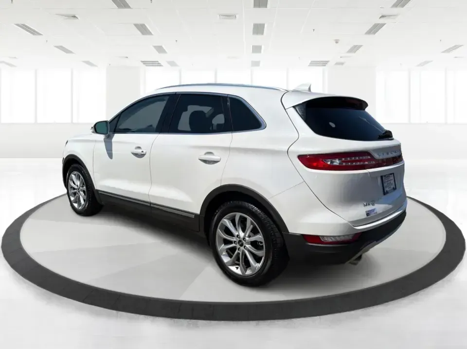 2015 Lincoln MKC Base (5LMTJ2AH4FU) with an 2.3L L4 DOHC 16V engine, 6-Speed Automatic transmission, located at 1230 East Main St, Xenia, OH, 45385, (937) 908-9800, 39.688026, -83.910172 - Upgrade your everyday drive with a compact luxury SUV that fits real life-comfortable for long commutes up and down US-35, confident for snowy Ohio mornings, and polished enough for date night in downtown Xenia or a weekend escape to John Bryan State Park. This **2015 Lincoln MKC Base** in **White** - Photo#4