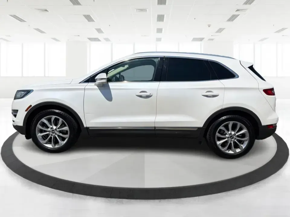 2015 Lincoln MKC Base (5LMTJ2AH4FU) with an 2.3L L4 DOHC 16V engine, 6-Speed Automatic transmission, located at 1230 East Main St, Xenia, OH, 45385, (937) 908-9800, 39.688026, -83.910172 - Upgrade your everyday drive with a compact luxury SUV that fits real life-comfortable for long commutes up and down US-35, confident for snowy Ohio mornings, and polished enough for date night in downtown Xenia or a weekend escape to John Bryan State Park. This **2015 Lincoln MKC Base** in **White** - Photo#5
