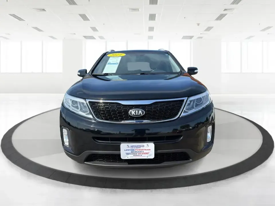 2014 Kia Sorento LX 2WD (5XYKT3A68EG) with an 2.4L L4 DOHC 16V engine, 6-Speed Automatic transmission, located at 1099 N County Rd 25A, Troy, OH, 45373, (937) 908-9800, 40.057079, -84.212883 - Weekend road trips to Indian Lake, daily commutes down I-75, or hauling sports gear across Troy-this 2014 Kia Sorento LX is the kind of SUV that fits real life. Finished in Ebony Black and built for practicality, it's a smart pick for growing families, busy professionals, and budget-conscious buyers - Photo#7