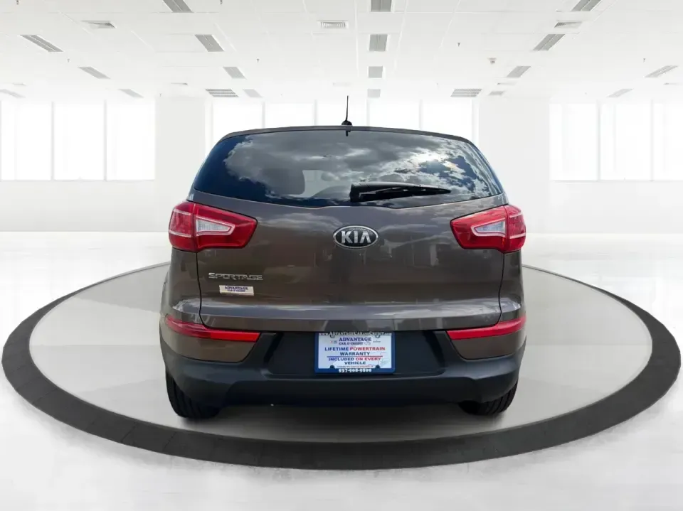 2013 Kia Sportage LX (KNDPBCA27D7) with an 2.4L I-4 DOHC engine, 6-Speed Automatic transmission, located at 1099 N County Rd 25A, Troy, OH, 45373, (937) 908-9800, 40.057079, -84.212883 - Pack up for a weekend at Troy Community Park, tackle a snowy school run, or cruise I75 for your daily commute-this 2013 Kia Sportage LX is the kind of compact SUV that fits real life in West Central Ohio. With its versatile crossover size, confident AWD capability, and practical cargo space, it's a - Photo#3