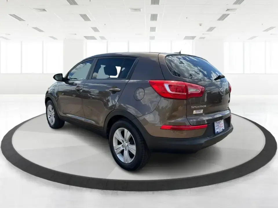 2013 Kia Sportage LX (KNDPBCA27D7) with an 2.4L I-4 DOHC engine, 6-Speed Automatic transmission, located at 1099 N County Rd 25A, Troy, OH, 45373, (937) 908-9800, 40.057079, -84.212883 - Pack up for a weekend at Troy Community Park, tackle a snowy school run, or cruise I75 for your daily commute-this 2013 Kia Sportage LX is the kind of compact SUV that fits real life in West Central Ohio. With its versatile crossover size, confident AWD capability, and practical cargo space, it's a - Photo#4