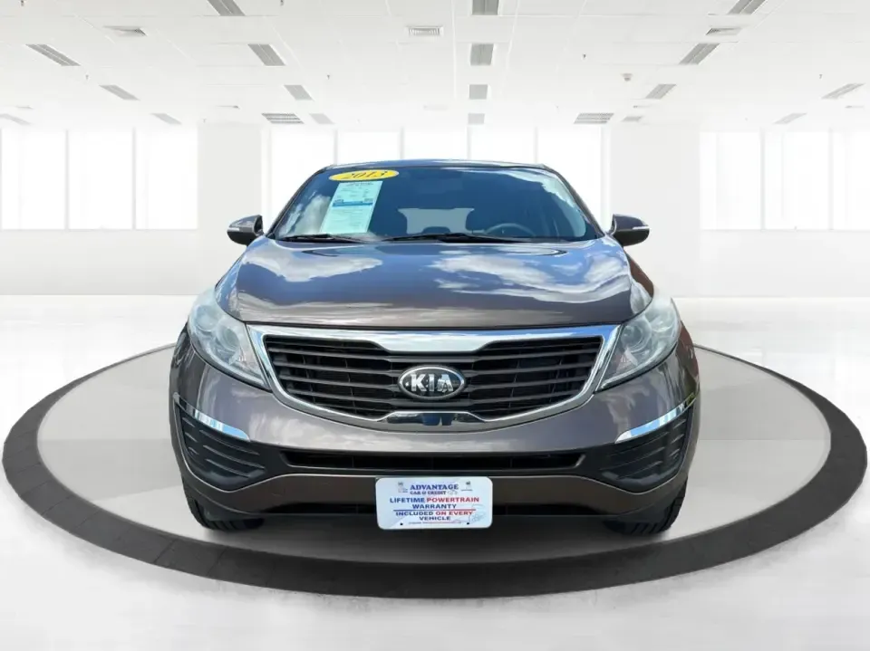 2013 Kia Sportage LX (KNDPBCA27D7) with an 2.4L I-4 DOHC engine, 6-Speed Automatic transmission, located at 1099 N County Rd 25A, Troy, OH, 45373, (937) 908-9800, 40.057079, -84.212883 - Pack up for a weekend at Troy Community Park, tackle a snowy school run, or cruise I75 for your daily commute-this 2013 Kia Sportage LX is the kind of compact SUV that fits real life in West Central Ohio. With its versatile crossover size, confident AWD capability, and practical cargo space, it's a - Photo#7