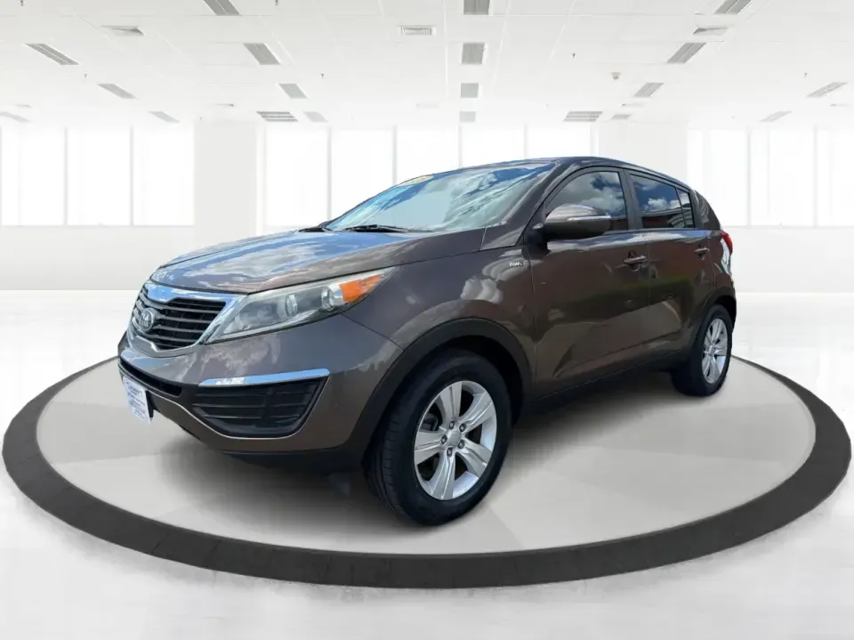2013 Kia Sportage LX (KNDPBCA27D7) with an 2.4L I-4 DOHC engine, 6-Speed Automatic transmission, located at 1099 N County Rd 25A, Troy, OH, 45373, (937) 908-9800, 40.057079, -84.212883 - Pack up for a weekend at Troy Community Park, tackle a snowy school run, or cruise I75 for your daily commute-this 2013 Kia Sportage LX is the kind of compact SUV that fits real life in West Central Ohio. With its versatile crossover size, confident AWD capability, and practical cargo space, it's a - Photo#8