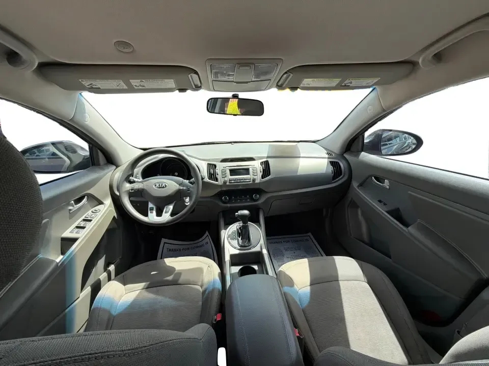 2013 Kia Sportage LX (KNDPBCA27D7) with an 2.4L I-4 DOHC engine, 6-Speed Automatic transmission, located at 1099 N County Rd 25A, Troy, OH, 45373, (937) 908-9800, 40.057079, -84.212883 - Pack up for a weekend at Troy Community Park, tackle a snowy school run, or cruise I75 for your daily commute-this 2013 Kia Sportage LX is the kind of compact SUV that fits real life in West Central Ohio. With its versatile crossover size, confident AWD capability, and practical cargo space, it's a - Photo#21