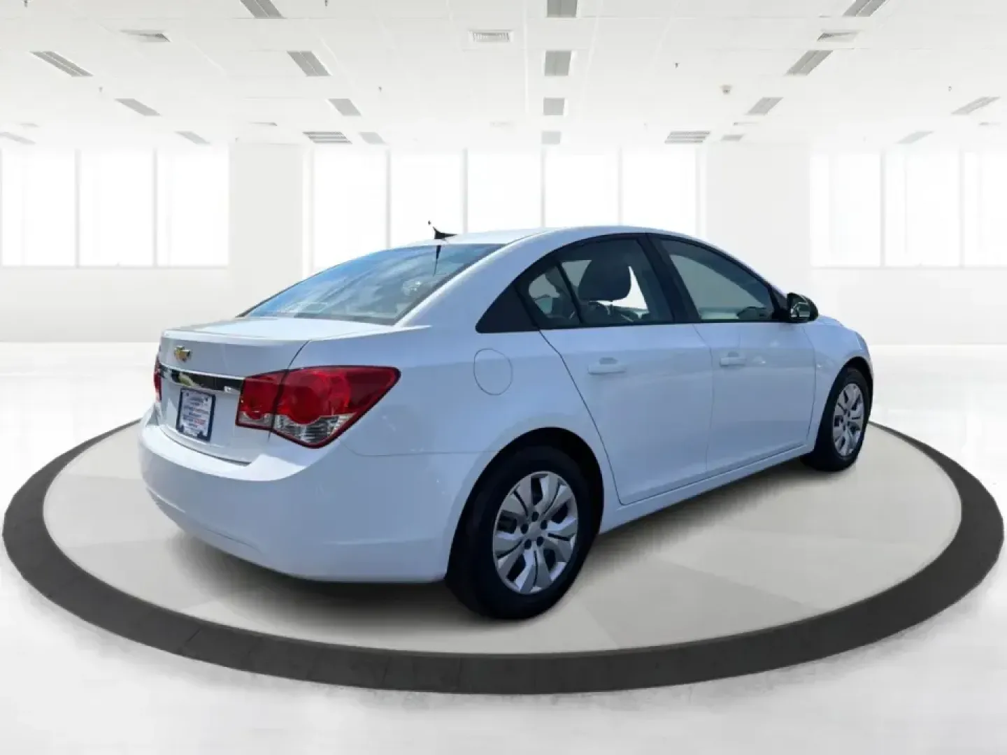 2014 Chevrolet Cruze LS Auto (1G1PA5SG0E7) with an 1.8L L4 DOHC 16V engine, 6-Speed Automatic transmission, located at 401 Woodman Dr, Riverside, OH, 45431, (937) 908-9800, 39.760899, -84.123421 - If your week is packed with work, school drop-offs, and errands up and down Woodman Dr, this 2014 Chevrolet Cruze LS Auto is the kind of practical, comfortable sedan that fits real life-easy to park, efficient for the commute, and ready for weekend runs to The Greene or a quick night out near Downto- Photo#2