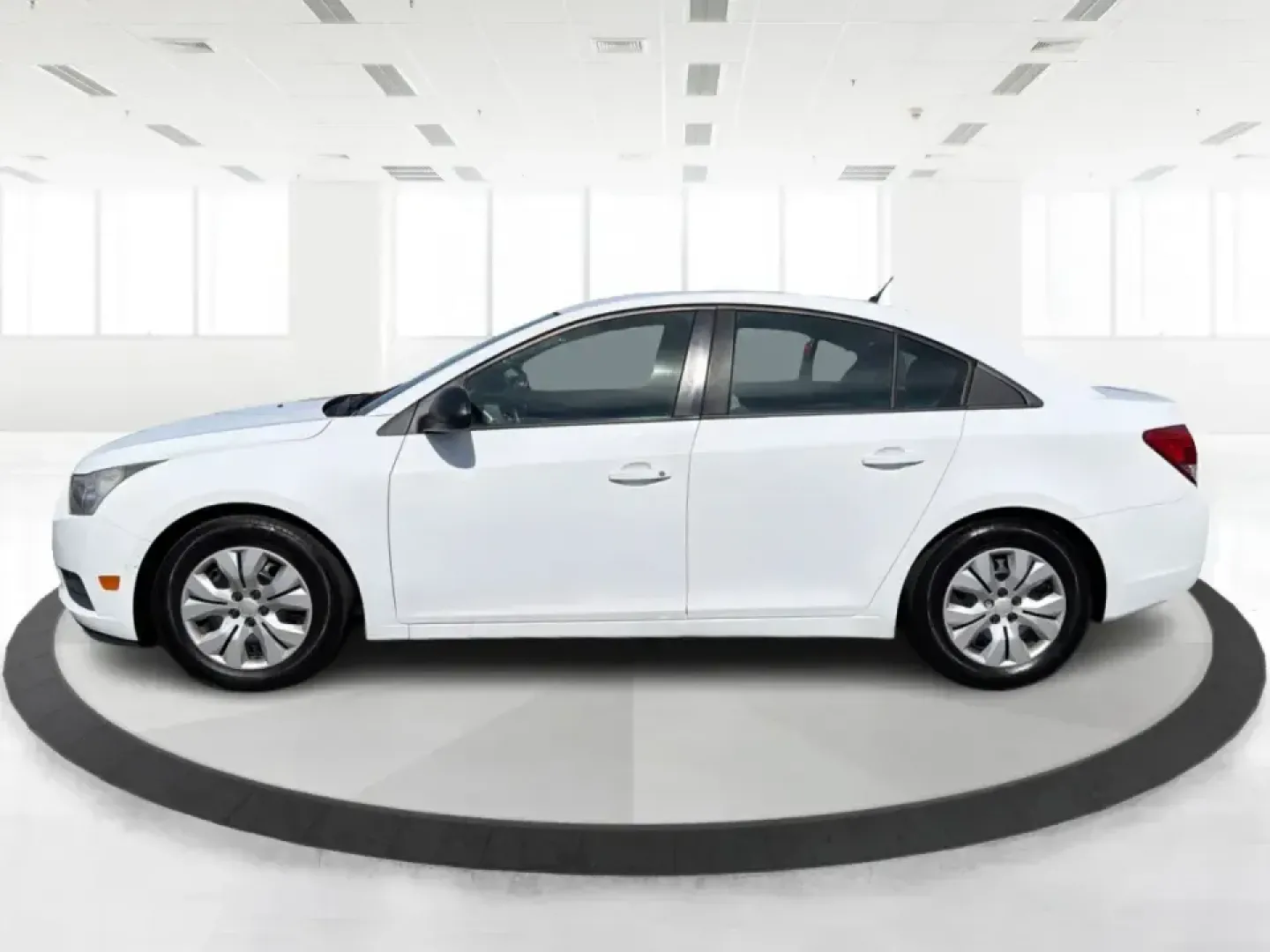 2014 Chevrolet Cruze LS Auto (1G1PA5SG0E7) with an 1.8L L4 DOHC 16V engine, 6-Speed Automatic transmission, located at 401 Woodman Dr, Riverside, OH, 45431, (937) 908-9800, 39.760899, -84.123421 - If your week is packed with work, school drop-offs, and errands up and down Woodman Dr, this 2014 Chevrolet Cruze LS Auto is the kind of practical, comfortable sedan that fits real life-easy to park, efficient for the commute, and ready for weekend runs to The Greene or a quick night out near Downto- Photo#5