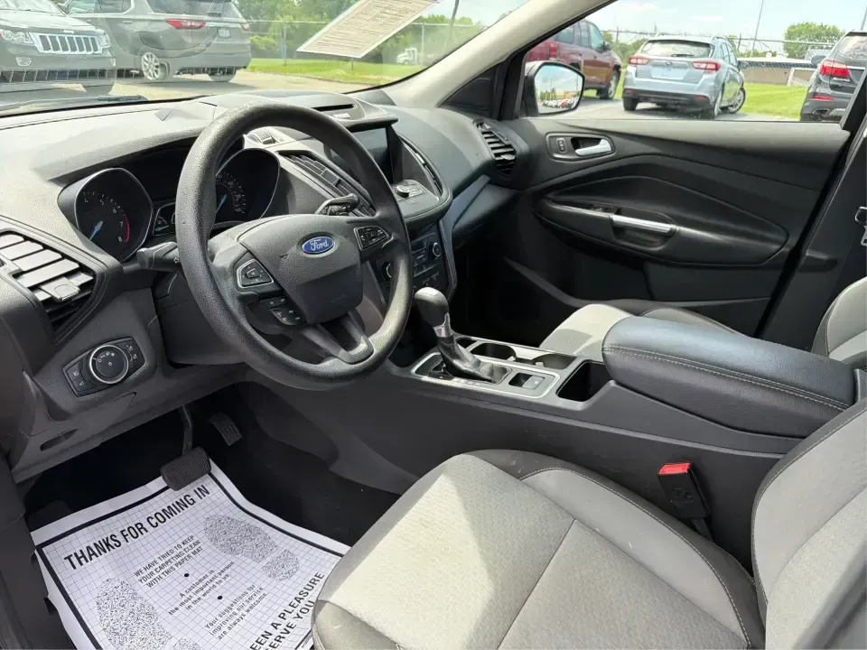 2017 Ford Escape SE (1FMCU0GD1HU) with an 1.5L L4 DOHC 16V engine, 6A transmission, located at 1099 N County Rd 25A, Troy, OH, 45373, (937) 908-9800, 40.057079, -84.212883 - Need a compact SUV that can handle the weekday commute on I75, school drop-offs around Troy, and spontaneous weekend getaways to Charleston Falls Preserve or a quick stroll through the Troy Strawberry Festival? This 2017 Ford Escape SE in Shadow Black is a practical, easy-to-live-with choice for bus - Photo#9