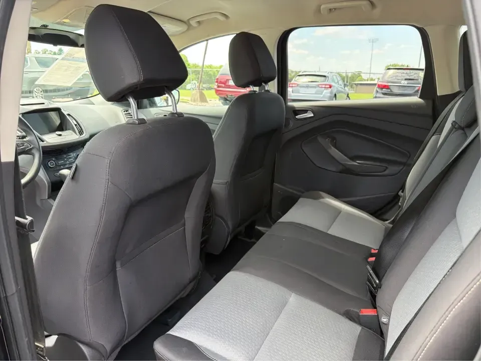 2017 Ford Escape SE (1FMCU0GD1HU) with an 1.5L L4 DOHC 16V engine, 6A transmission, located at 1099 N County Rd 25A, Troy, OH, 45373, (937) 908-9800, 40.057079, -84.212883 - Need a compact SUV that can handle the weekday commute on I75, school drop-offs around Troy, and spontaneous weekend getaways to Charleston Falls Preserve or a quick stroll through the Troy Strawberry Festival? This 2017 Ford Escape SE in Shadow Black is a practical, easy-to-live-with choice for bus - Photo#10