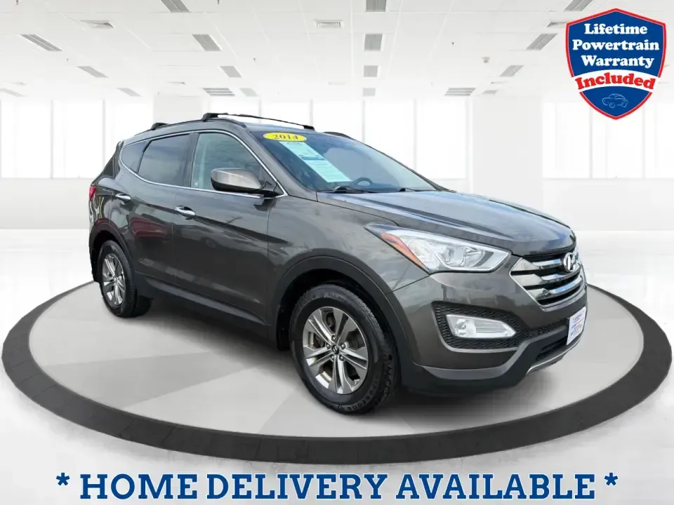 2014 Hyundai Santa Fe Sport 2.4 AWD (5XYZUDLB0EG) with an 2.4L L4 DOHC 16V engine, 6-Speed Automatic transmission, located at 4508 South Dixie Dr, Moraine, OH, 45439, (937) 908-9800, 39.689976, -84.218452 - Picture your next weekend escape: loading up the family, pointing the nose toward the MetroParks, and cruising I-75 with room for everyone and everything-without feeling like you're driving a bus. This 2014 Hyundai Santa Fe 2.4L in Cabo Bronze is a practical, road-trip-ready SUV that fits real life- Photo#0